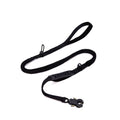Black dog leash with handle and clip on a white background